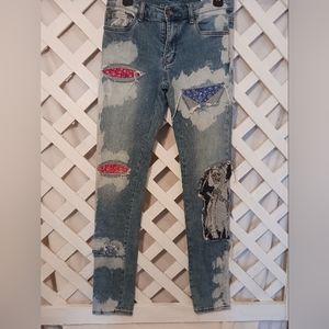 Mnmi skinny blue jeans with cut-out patches, unisex waist 29. NWOT